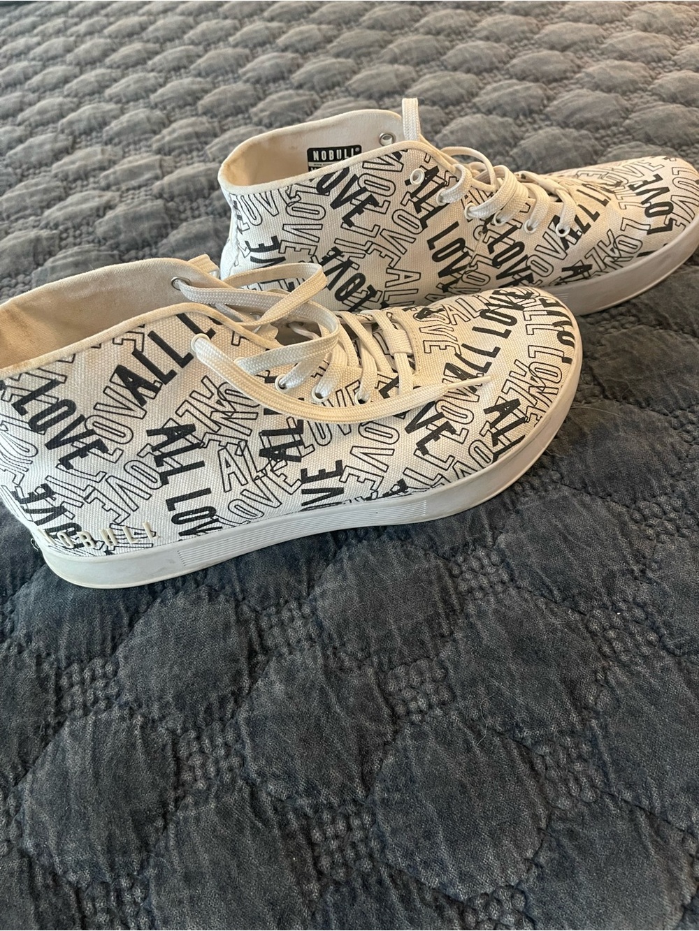 NOBULL Cream High-Top Kids Sneakers with Black Graphic Text